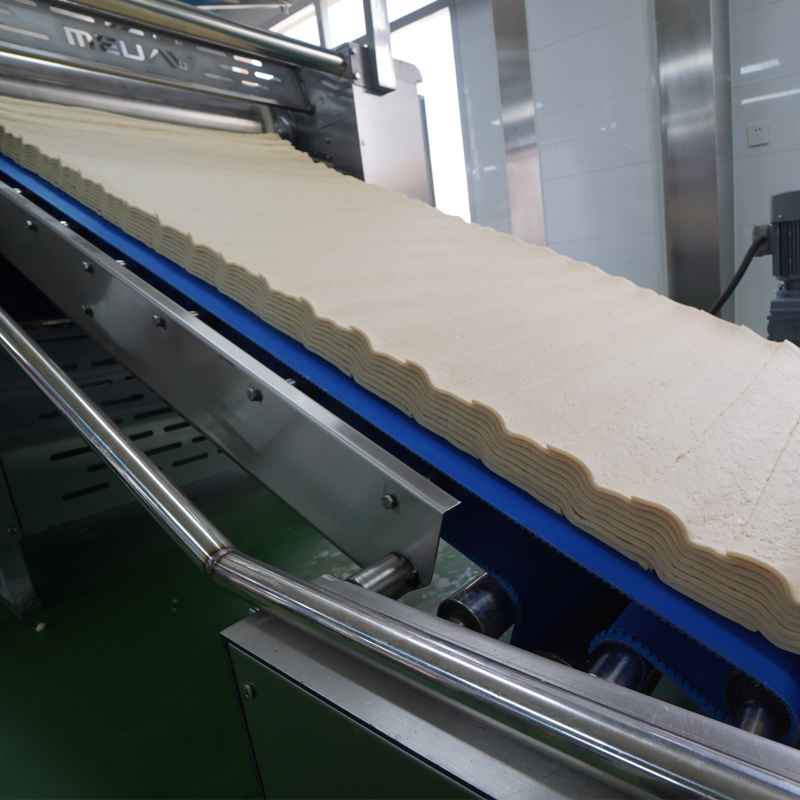 Sheet laminating machine